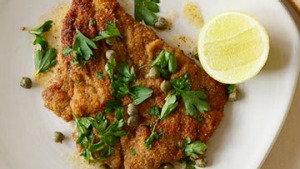 Mustard-basted牛肉炸肉排。
